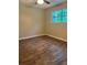 Cozy bedroom with laminate floors and a window view at 4701 Flat Shoals Rd # 41-F, Union City, GA 30291