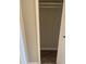 Empty closet space with open doors and laminate floor at 4701 Flat Shoals Rd # 41-F, Union City, GA 30291