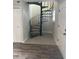 Entryway showcasing a spiral staircase and wood-look floors at 4701 Flat Shoals Rd # 41-F, Union City, GA 30291