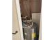 Utility room with a hot water heater and some pipes at 4701 Flat Shoals Rd # 41-F, Union City, GA 30291