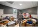 Unfinished basement space filled with storage, ready for new owner customization at 7635 Wynfield Dr, Cumming, GA 30040