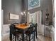 Elegant dining room features a hanging chandelier and high ceilings at 7635 Wynfield Dr, Cumming, GA 30040