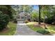 Charming two-story home featuring a well-manicured lawn and inviting curb appeal at 7635 Wynfield Dr, Cumming, GA 30040