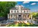 Backyard showcasing the patio with the pool, seating area, and privacy fence at 790 Lakeview Ne Ave, Atlanta, GA 30308