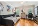 Comfortable bedroom with hardwood floors, an area for study, and natural light at 790 Lakeview Ne Ave, Atlanta, GA 30308