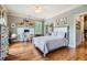 Comfortable bedroom with a large window, hardwood floors, and a study area at 790 Lakeview Ne Ave, Atlanta, GA 30308