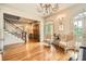 Grand foyer featuring hardwood floors, staircase, and elegant decor leading to various rooms at 790 Lakeview Ne Ave, Atlanta, GA 30308