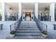 Elegant entrance featuring brick steps, black iron railings, and prominent columns at 790 Lakeview Ne Ave, Atlanta, GA 30308