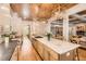 Open kitchen showcasing large island with granite countertops, modern appliances, and wooden accents at 790 Lakeview Ne Ave, Atlanta, GA 30308