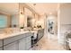 Luxurious bathroom featuring granite countertops, dual sinks, and elegant fixtures at 790 Lakeview Ne Ave, Atlanta, GA 30308