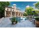 Backyard oasis features pool, spa, patio, outdoor seating, and professionally landscaped yard at 790 Lakeview Ne Ave, Atlanta, GA 30308
