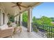 Expansive porch features wrought iron railings, comfortable seating, and scenic views at 790 Lakeview Ne Ave, Atlanta, GA 30308