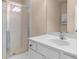Bright bathroom featuring a step-in shower with glass door, white countertop and vanity at 1973 Cobblestone Cir, Brookhaven, GA 30319