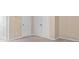 Bedroom with neutral color scheme, carpeted floors, white doors and closet at 1973 Cobblestone Cir, Brookhaven, GA 30319