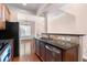 Kitchen with stainless steel appliances, granite counters, and wood cabinets at 1973 Cobblestone Cir, Brookhaven, GA 30319