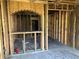 Unfinished basement space with exposed framing ready for customization at 678 Sweet Ashley Way, Loganville, GA 30052