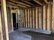 Unfinished basement awaiting transformation, featuring visible utilities at 678 Sweet Ashley Way, Loganville, GA 30052