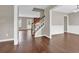 Welcoming entryway with hardwood floors and a staircase to the upper level at 1280 Chandler Ridge Dr, Lawrenceville, GA 30045