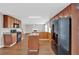 Large kitchen with stainless steel appliances, a center island, and ample cabinet space at 1280 Chandler Ridge Dr, Lawrenceville, GA 30045