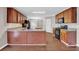 Functional kitchen with stainless steel appliances, wood cabinetry, and an island at 1280 Chandler Ridge Dr, Lawrenceville, GA 30045