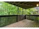 Spacious outdoor balcony with wooded views, perfect for relaxing at 2510 Cumberland Se Ct, Smyrna, GA 30080