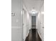 Hallway with hardwood floors and neutral paint at 2510 Cumberland Se Ct, Smyrna, GA 30080