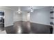 Spacious living area with hardwood floors and open layout to kitchen area at 2510 Cumberland Se Ct, Smyrna, GA 30080