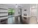 Bright and airy living room featuring hardwood floors and fireplace at 2510 Cumberland Se Ct, Smyrna, GA 30080