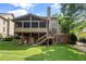 Spacious backyard with covered patio and well-maintained lawn at 4840 Spring Park Cir, Suwanee, GA 30024