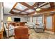 Relaxing basement area featuring comfortable couches and a television for entertainment at 4840 Spring Park Cir, Suwanee, GA 30024