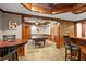 Finished basement with game table, pool table, and wet bar with seating at 4840 Spring Park Cir, Suwanee, GA 30024