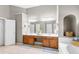Spacious bathroom features a double sink vanity, soaking tub, and ample storage at 4840 Spring Park Cir, Suwanee, GA 30024