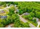 Aerial view of a neighborhood showcasing lush greenery, spacious lots, and well-maintained homes at 5995 Azalea Ridge Dr, Douglasville, GA 30135