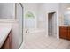 A bathroom showcases a shower, a bathtub under a window, and wood cabinetry at 5995 Azalea Ridge Dr, Douglasville, GA 30135