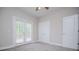 Bright bedroom featuring French doors, creating a peaceful retreat with ample natural light at 5995 Azalea Ridge Dr, Douglasville, GA 30135