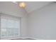 A carpeted bedroom with two windows and light gray paint at 5995 Azalea Ridge Dr, Douglasville, GA 30135