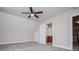 Spacious bedroom with ceiling fan and bathroom access, creating a comfortable Primary suite at 5995 Azalea Ridge Dr, Douglasville, GA 30135