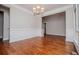 Dining room with hardwood floors, white wainscoting and neutral walls at 5995 Azalea Ridge Dr, Douglasville, GA 30135