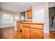 Charming kitchen view featuring wood cabinets and adjacent breakfast area at 5995 Azalea Ridge Dr, Douglasville, GA 30135