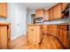 Kitchen featuring wood cabinets, hardwood floors and stainless steel appliances at 5995 Azalea Ridge Dr, Douglasville, GA 30135