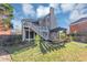 Lovely backyard features a deck, pergola, screened porch and well-maintained landscaping at , Suwanee, GA 30024