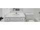 Close up of a bathroom vanity with sink, toilet, and tub at , Suwanee, GA 30024