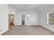 A spacious bedroom featuring doors to a bathroom and closet at , Suwanee, GA 30024