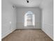 A bedroom featuring a wall of wainscoting and a curved window at , Suwanee, GA 30024