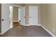 Neutral bedroom with carpet, white trim, and natural light at , Suwanee, GA 30024