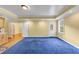 Bonus room features a tray ceiling, recessed lighting, and access to the kitchenette and exterior at , Suwanee, GA 30024