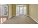 Sunlit living room with plush carpet, neutral walls, and a bay window offering ample natural light at , Suwanee, GA 30024