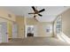 Spacious main bedroom with a ceiling fan, large window, and entry to the main bathroom featuring dual vanities at , Suwanee, GA 30024