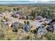 Wide aerial shot showcases the neighborhood with trees, landscaping and homes at , Suwanee, GA 30024