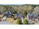 Aerial view of the homes on the street surrounded by mature trees at , Suwanee, GA 30024